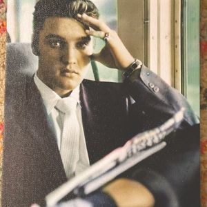 Vintage color print of Elvis on canvas.
